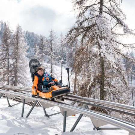 luge sur rail hiver Les Orres, activités en famille dans les Hautes-Alpes